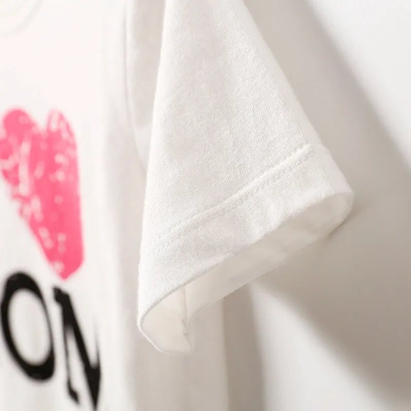Short sleeve triangle romper in cotton with Love Mum and Love Dad prints, available in 59cm to 80cm suitable heights.