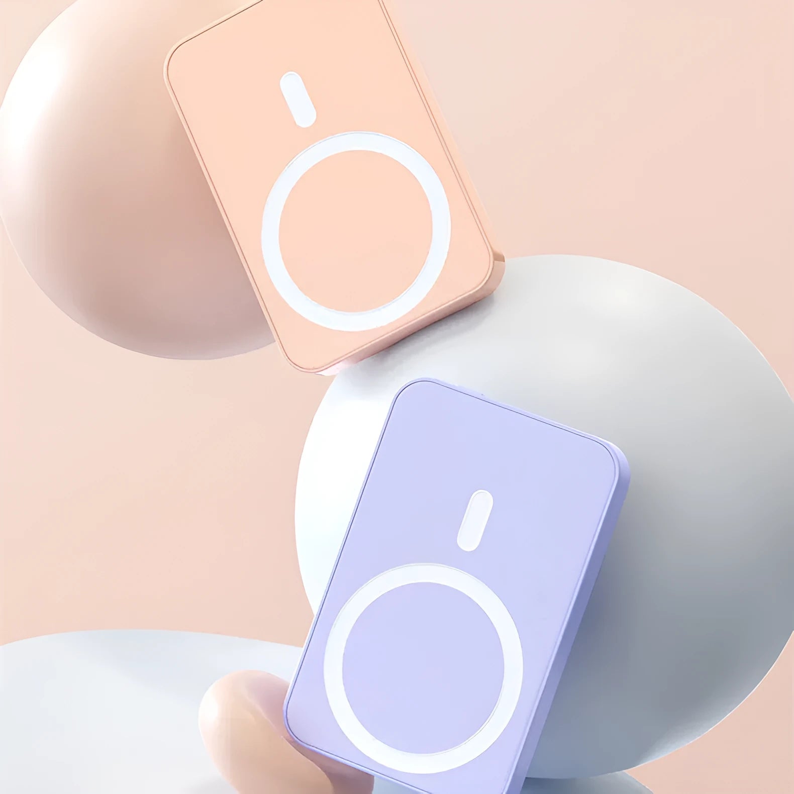Pink, purple and white magnetic wireless power bank showing 20000mAh capacity and compact size.