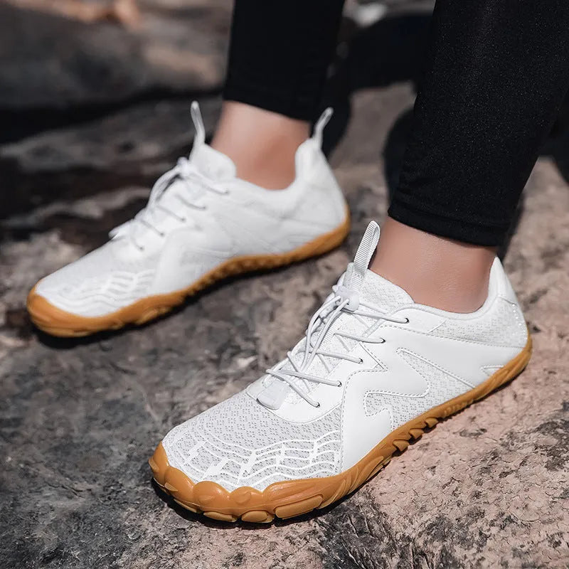 A pair of unisex sports climbing shoes with a Flyknit lining and rubber sole.