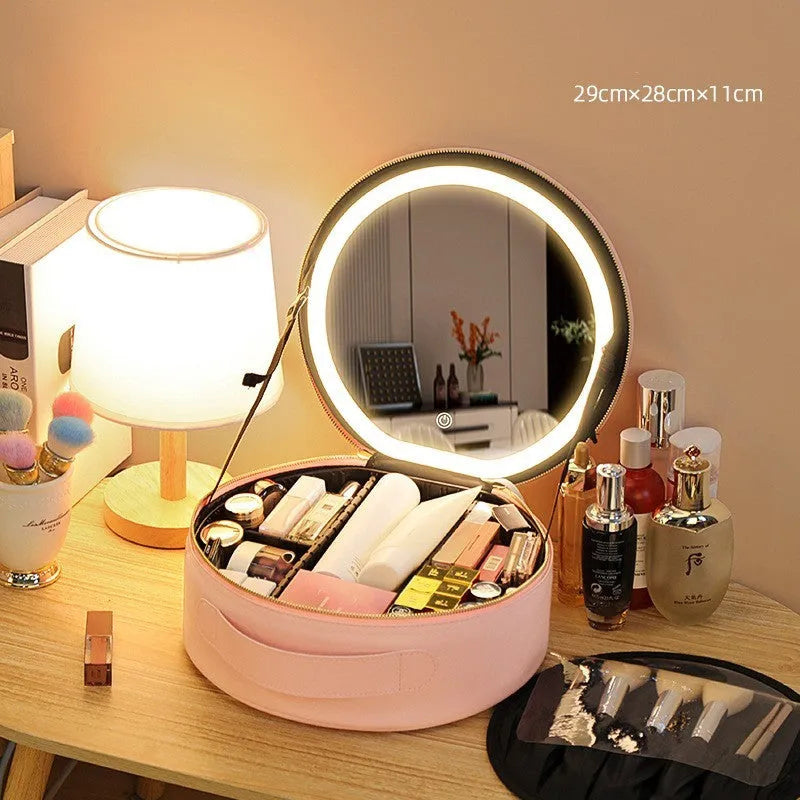 Round cherry blossom pink LED makeup bag open showing internal mirror, lights, and cosmetic partitions.