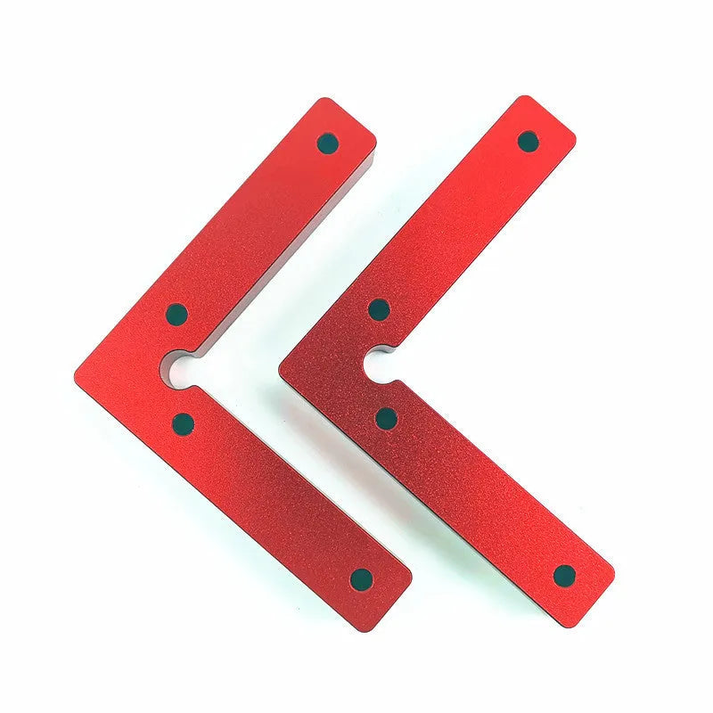 Aluminium woodworking right angle positioning block with engraved scale, shown next to a clamp.