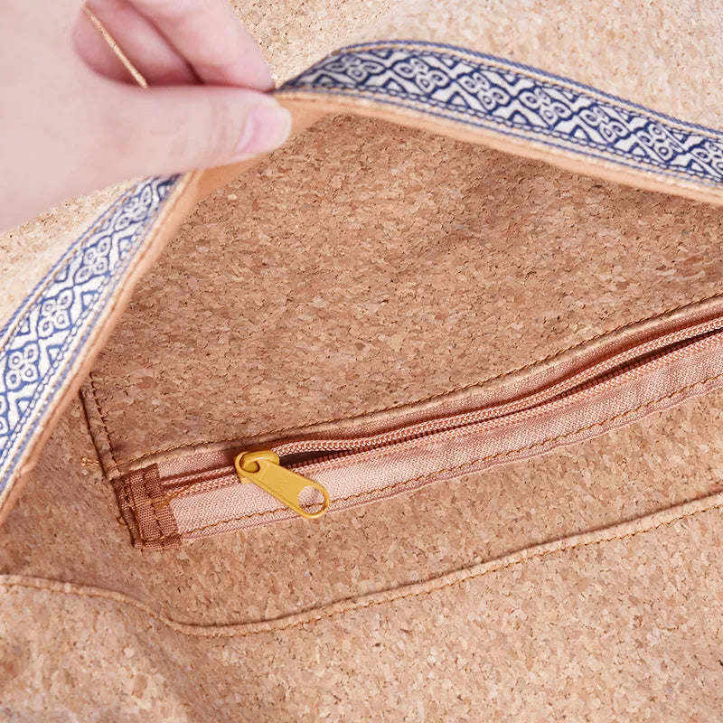 Cork yoga backpack in Cork colour with oversized zip pockets, made from cork and polyester.