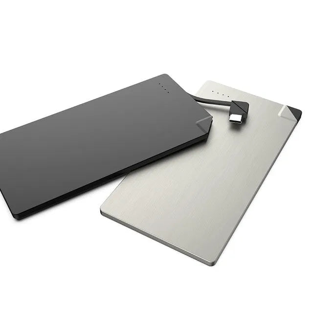 Silver ultra-thin graphene power bank measuring 140x72x4mm with 4000mAh capacity