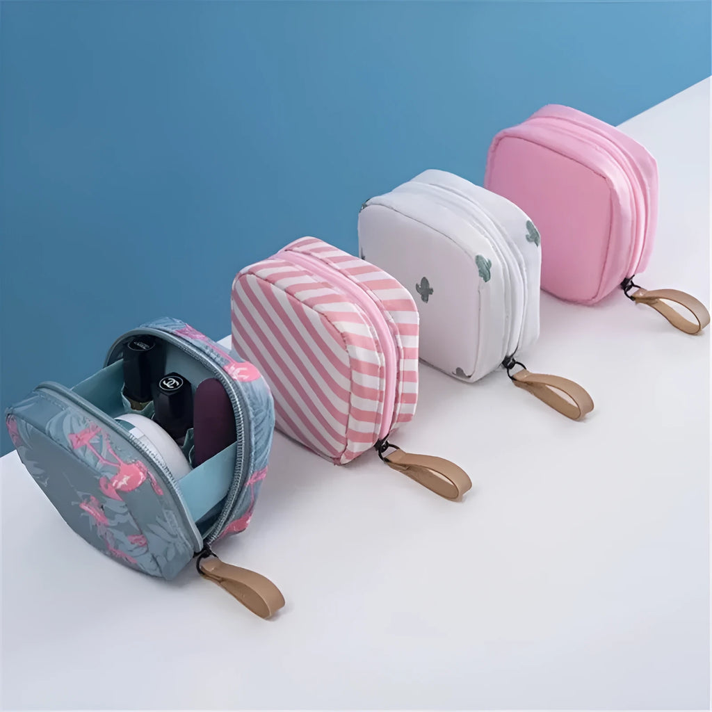 Cloth cube makeup storage bag in blue, pink, white, and white pink colours with a plain pattern.