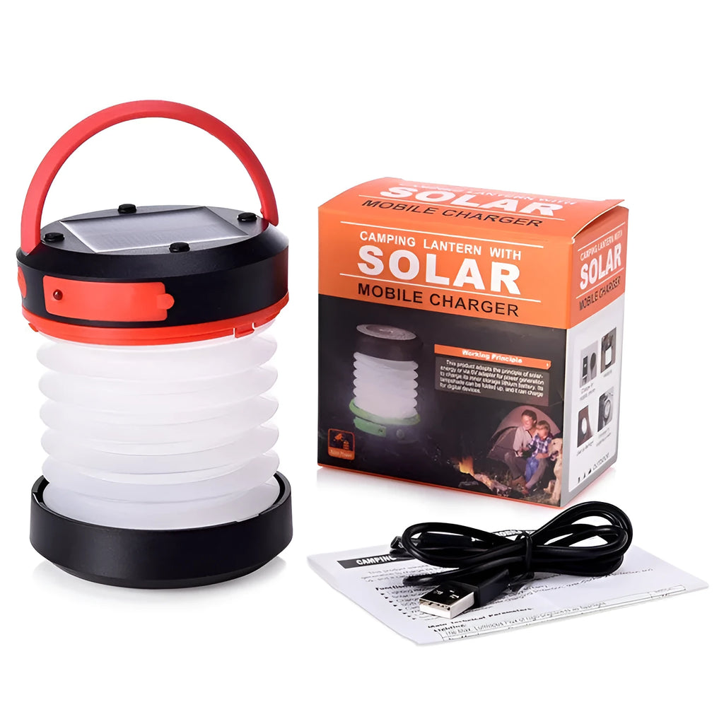 SolarBoom collapsible lantern in green with solar panel, collapsed for storage, on a wooden surface