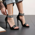 High heel stiletto sandals open toe with buckle strap in black artificial PU