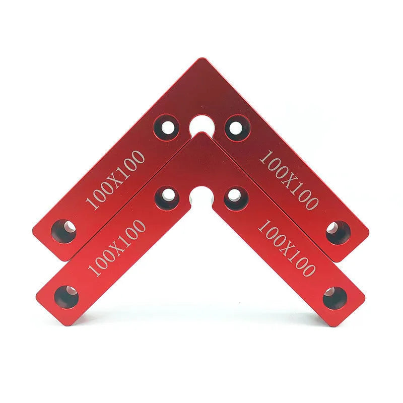 Aluminium woodworking right angle positioning block with engraved scale, shown next to a clamp.