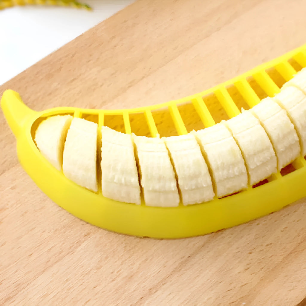 Yellow banana cutter made from food grade PP, approx. 25 x 7 x 1.4 cm, for slicing a whole banana in one motion