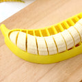 Yellow banana cutter made from food grade PP, approx. 25 x 7 x 1.4 cm, for slicing a whole banana in one motion