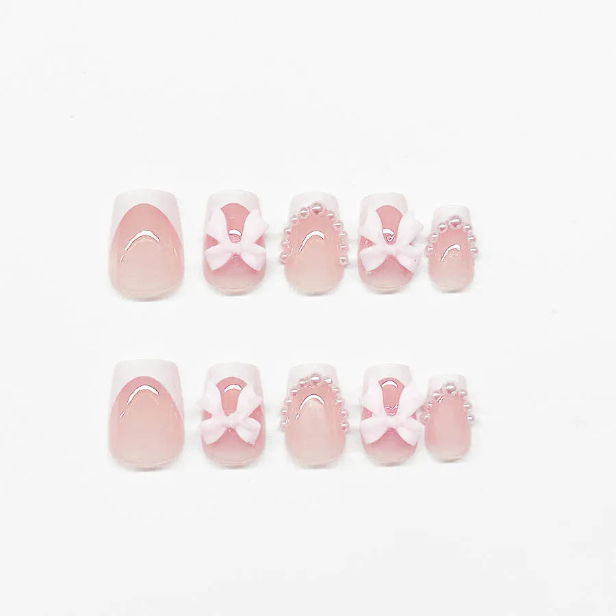 S274 French manicure gel strips with white tips, bow, and tulip designs for short square nails on a blush base.