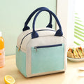 Insulated lunch bag in blue made from waterproof Oxford cloth with aluminium foil lamination.