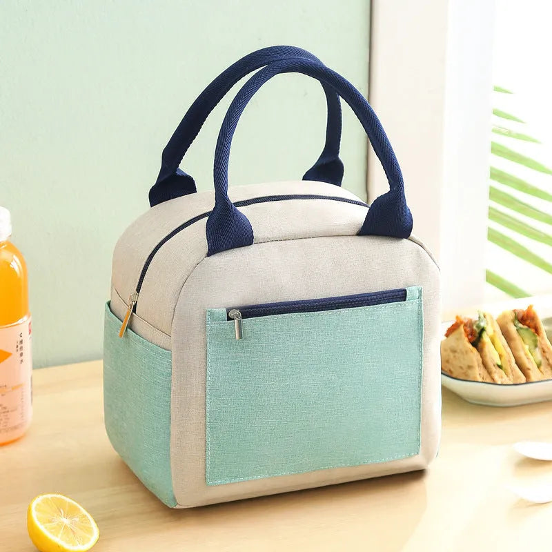 Insulated lunch bag in blue made from waterproof Oxford cloth with aluminium foil lamination.
