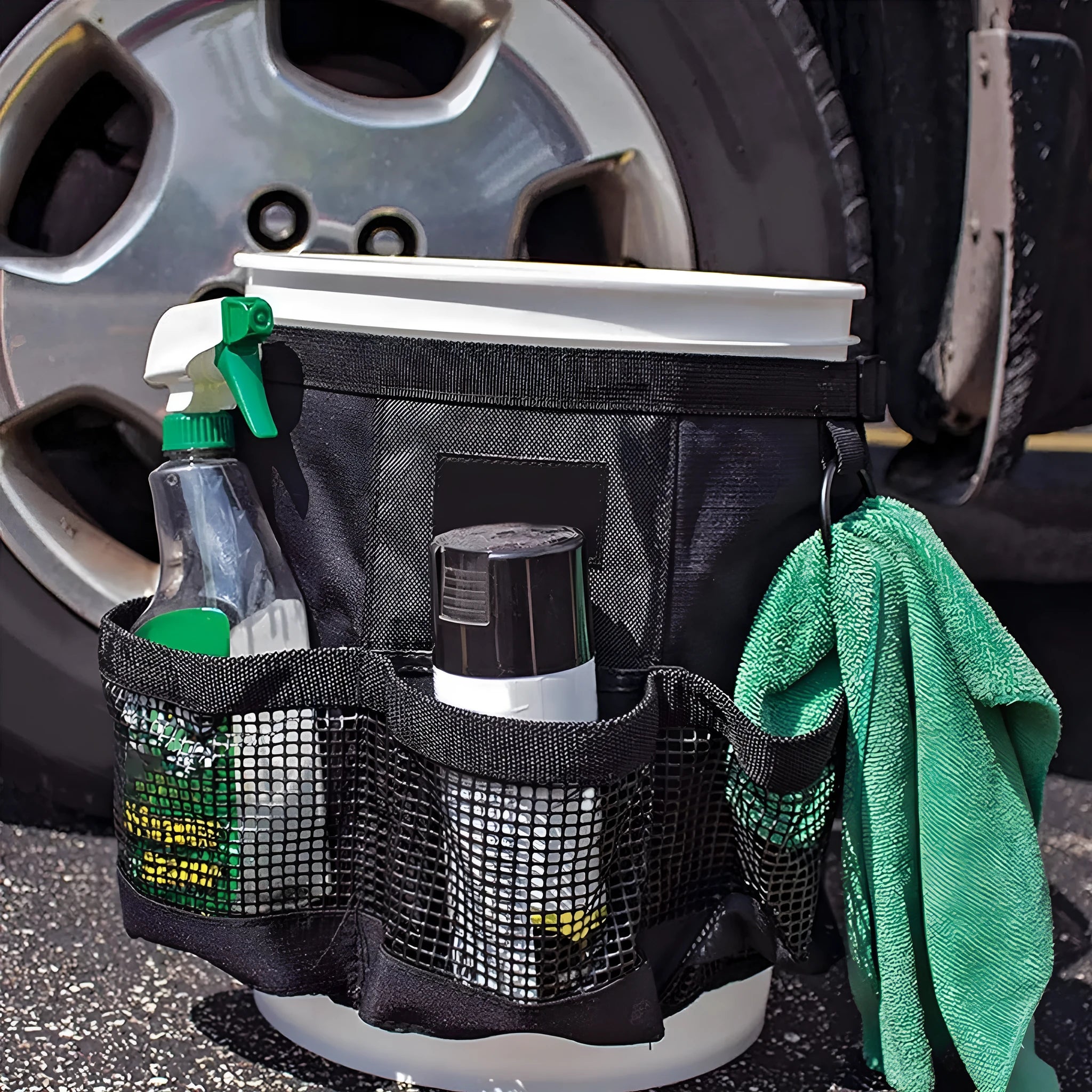 Black cylindrical polyester hanging storage bag for 5 gallon barrel tools and organiser.