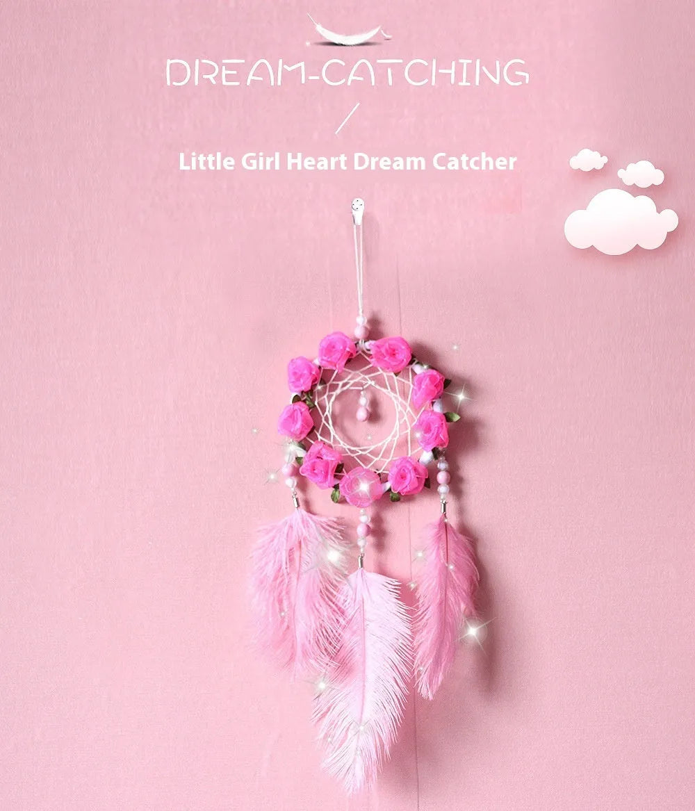 Pink ostrich feather dreamcatcher wall decoration ornament measuring 10cm.