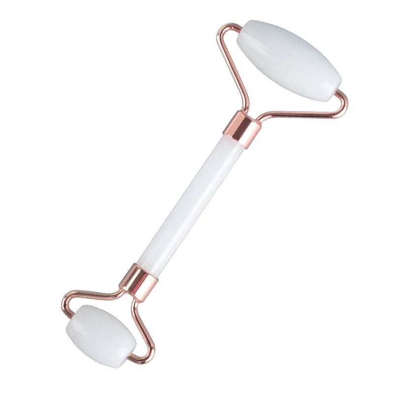 White jade double-headed roller and scraping board set for facial and body massage.