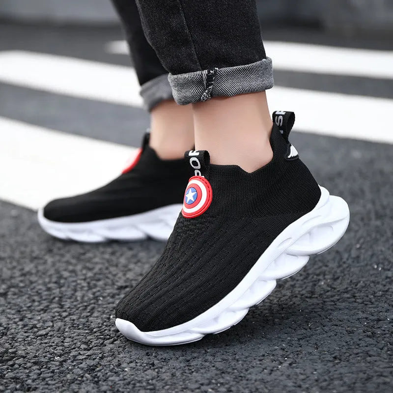 Children's black and white knitted overshoes with MD sole for runway use