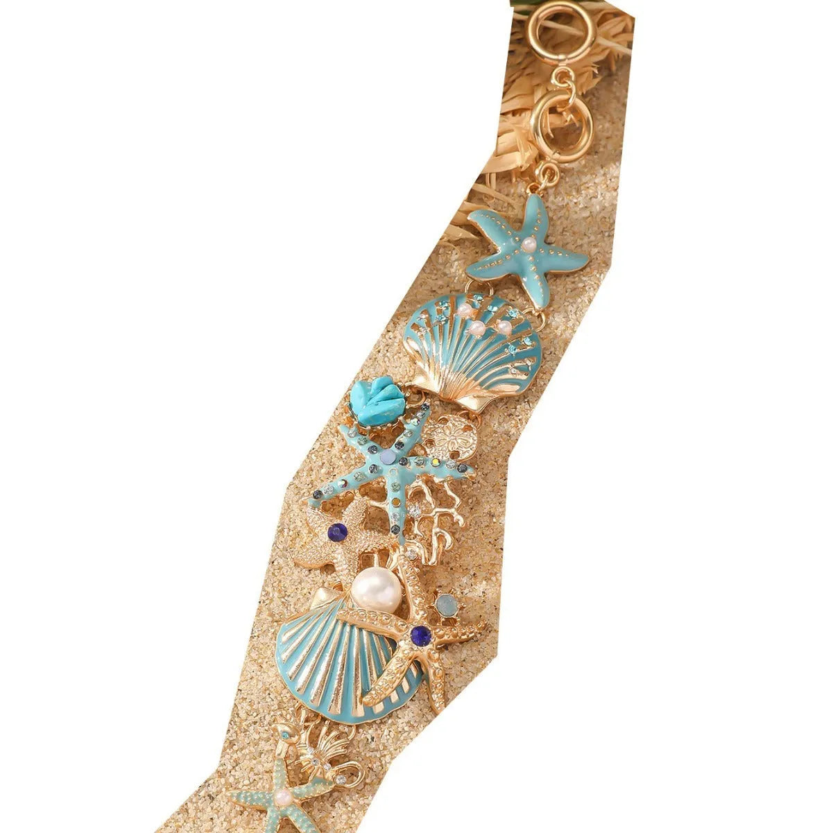 Women's alloy marine-themed bracelet with anchor, shell, and starfish charms in blue, red, or turquoise.