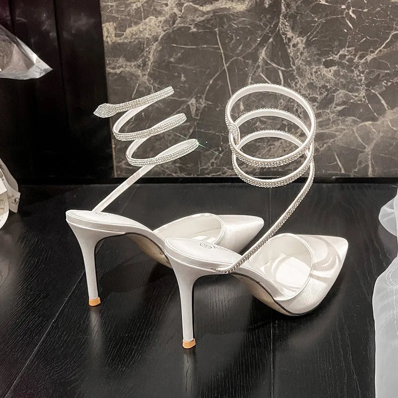 Women's pointed stiletto heel shoes in black velvet or white satin with 7cm or 9cm heel and ankle strap