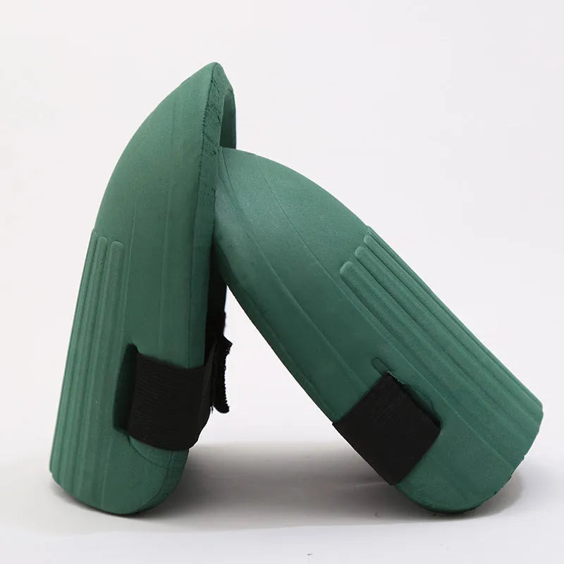 A pair of thick EVA foam knee pads in army green colour for garden and sports use.