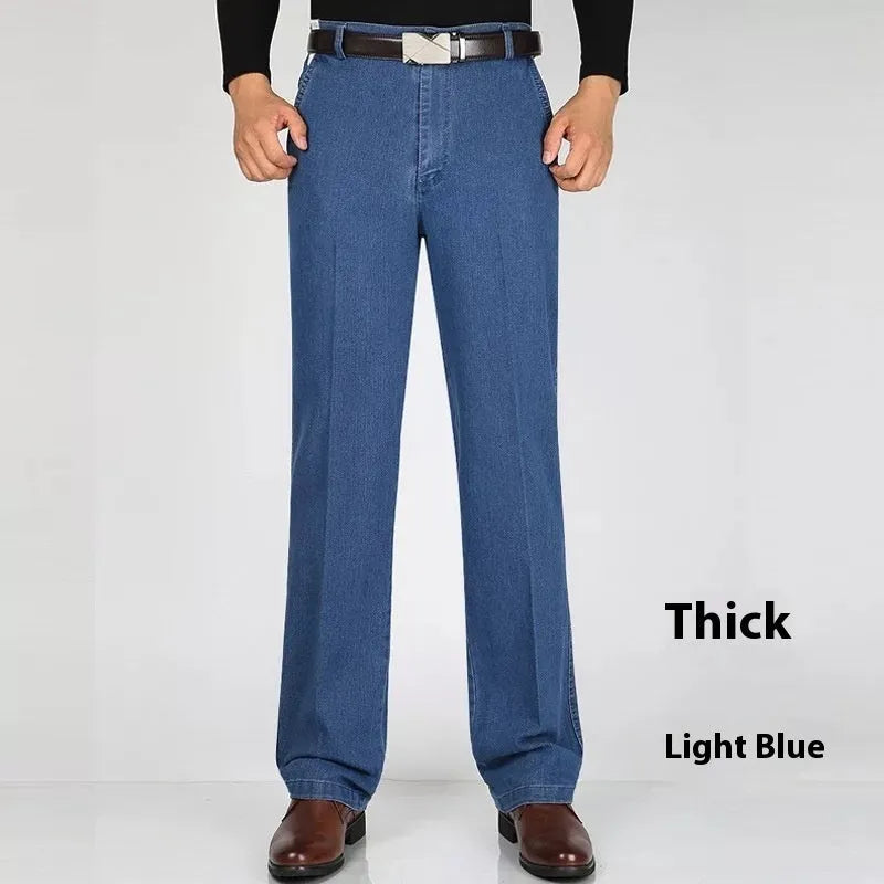 Men's high-waist loose fit blue denim trousers on a hanger, showing the casual cut and zipper fly.