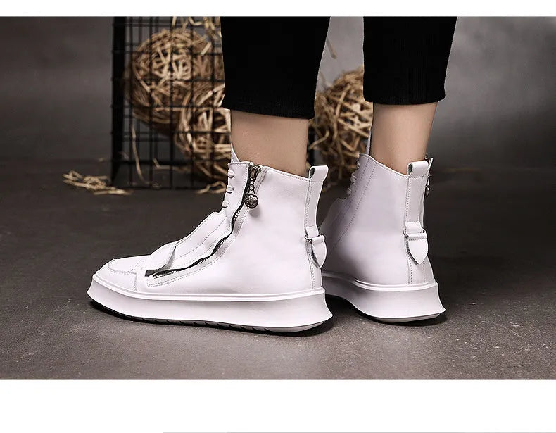 Men's black and white high-top style PU leather ankle boots on a size chart background.