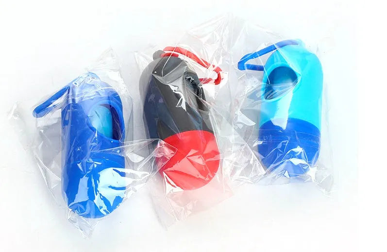 Roll of coloured pet waste disposal bags showing size of 22.5 by 30 centimetres