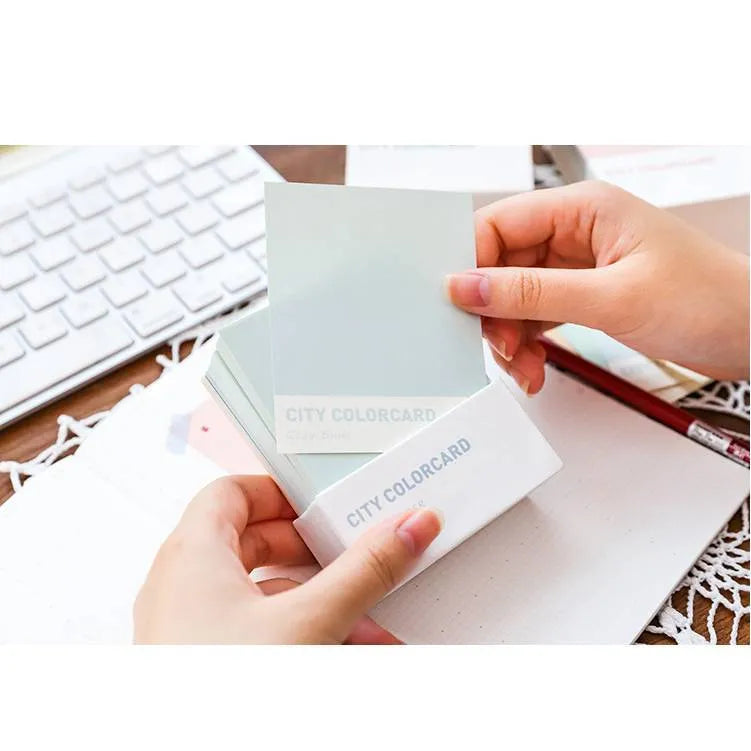 Set of rectangle memo note cards in four city colour styles, showing 75mm by 95mm size.