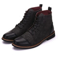 Men's black leather motorcycle boots with silver belt buckle detail on the side, featuring a thick rubber sole.