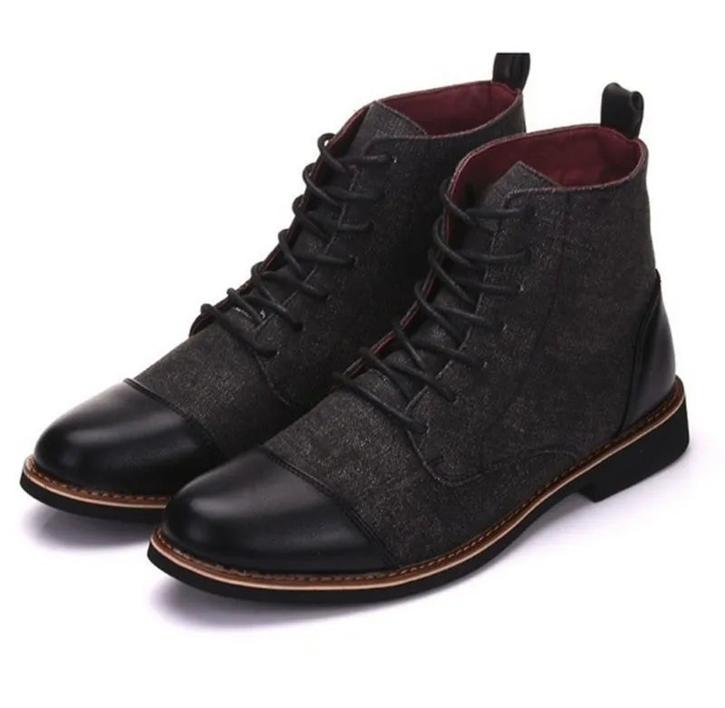 Men's black leather motorcycle boots with silver belt buckle detail on the side, featuring a thick rubber sole.