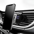 Black universal car phone holder attached to a car air vent, showing flexible gooseneck arm and adjustable phone cradle.