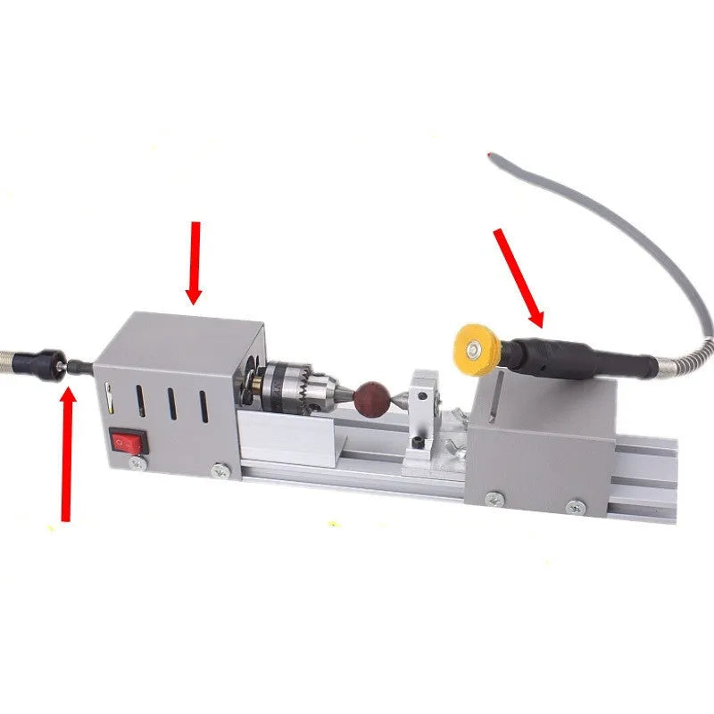 Mini manual woodworking lathe with silver metal construction and six carving knives