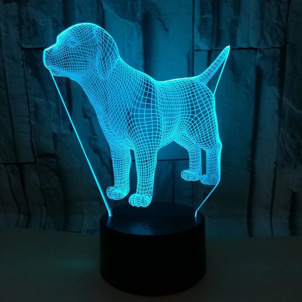 Dog-shaped USB mood lamp showing 7 colours with touch and remote control on a bedside table