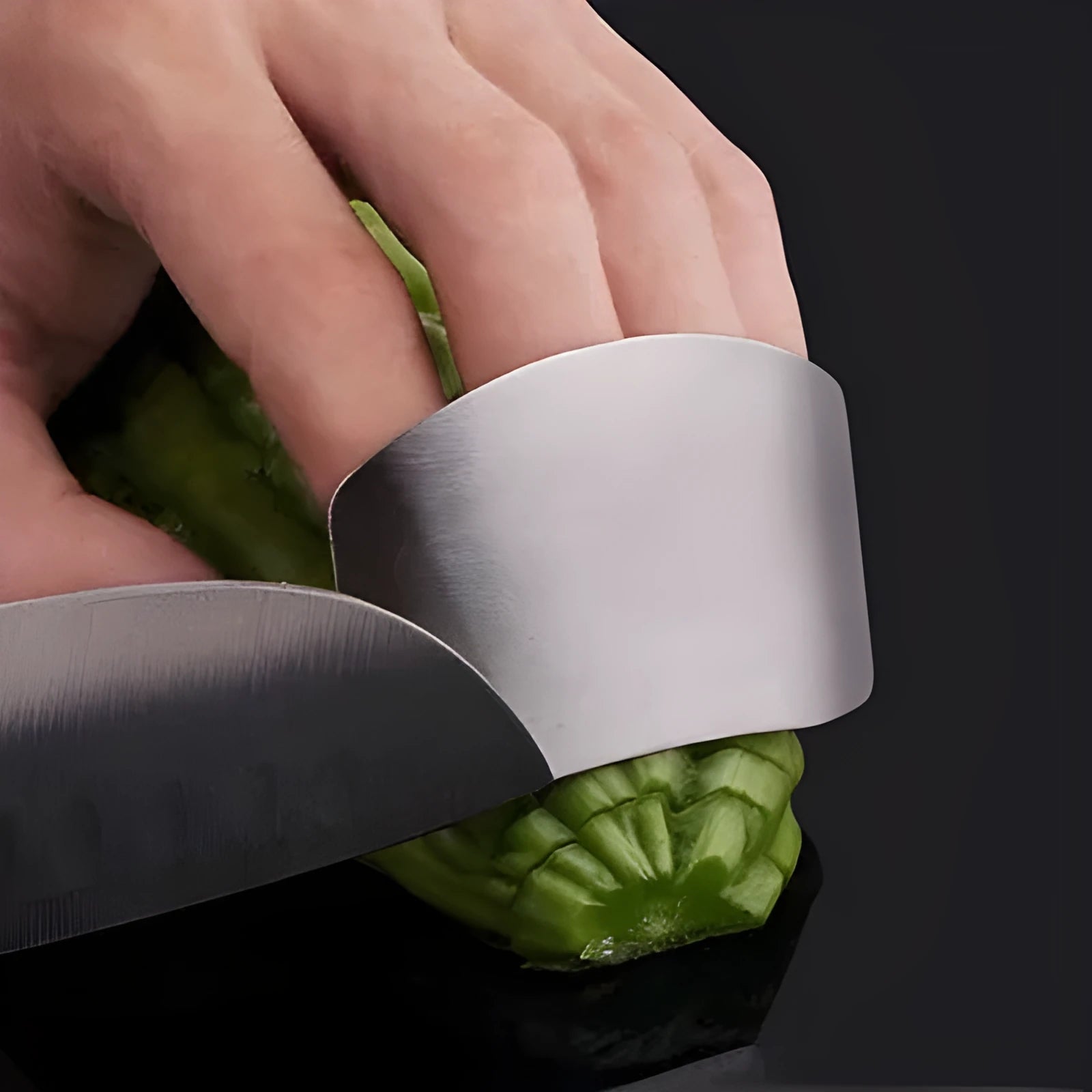 Stainless steel finger guard for cutting vegetables showing single and double finger protection options