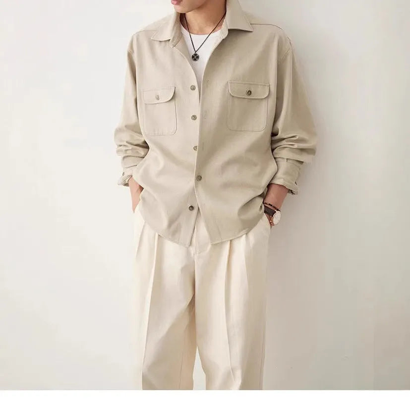 Men's light sand rice coloured shirt with a lapel collar and long sleeves.