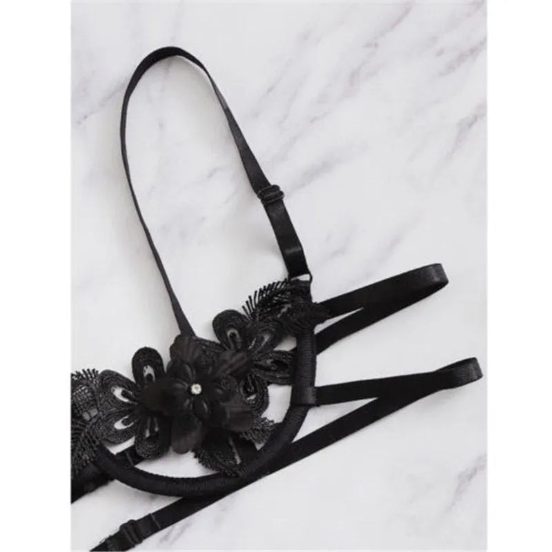 Women's half cup unlined bra and brief set in black with flower pattern and fitted straps