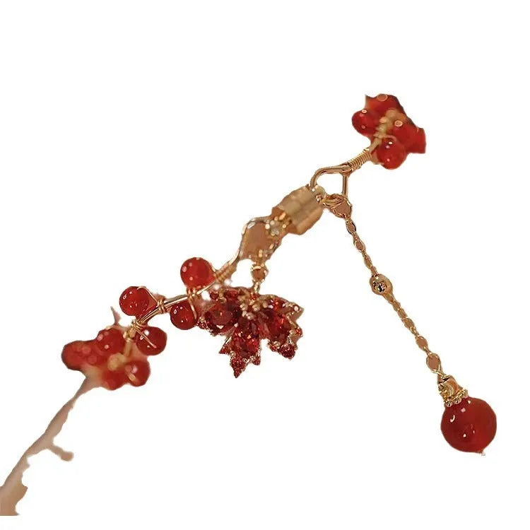 Red ginkgo leaf magnetic bracelet with electroplated alloy finish and adjustable sizing