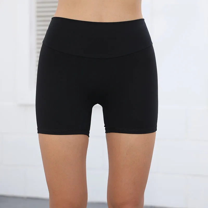 Women's high waist hip lifting shorts with pockets in quick-dry fabric for summer fitness
