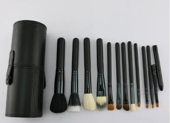 12-piece makeup brush set with wooden handles, aluminium tubes and PU storage tube, black and pink