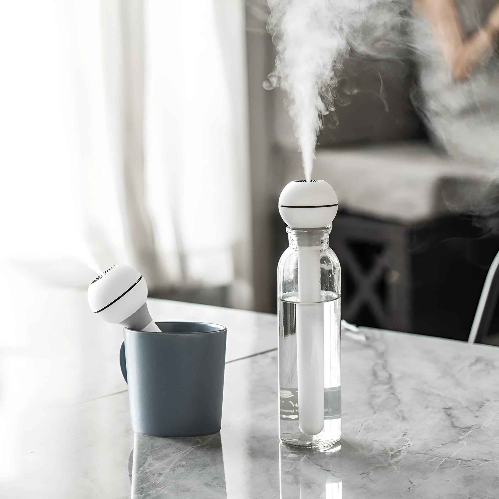 Columnar magic wand humidifier in pink or white with USB port and water tank