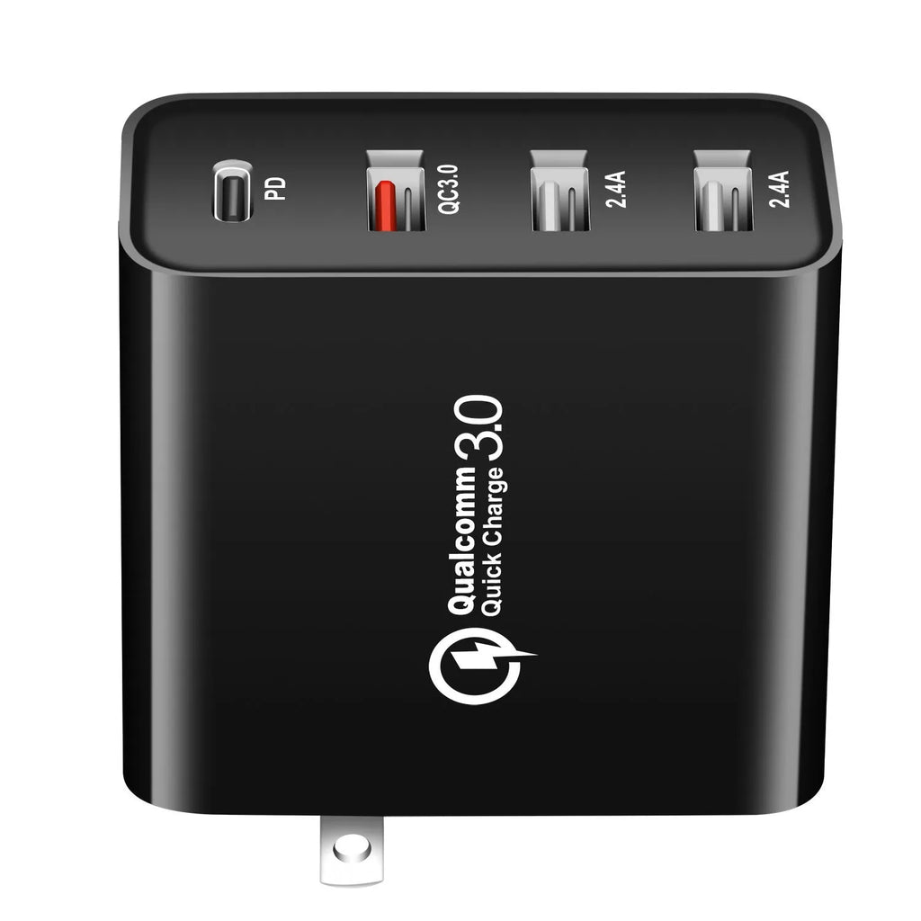 Black four-port USB-C wall charger with UK, US, EU, and AU plug adaptors on a white background.