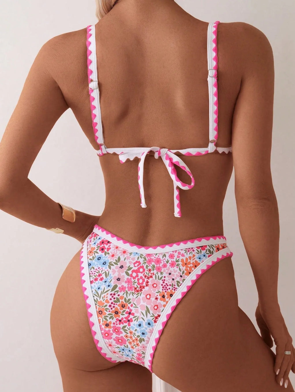 Women's printed lace-up bikini swimsuit with split side briefs in polyester fabric