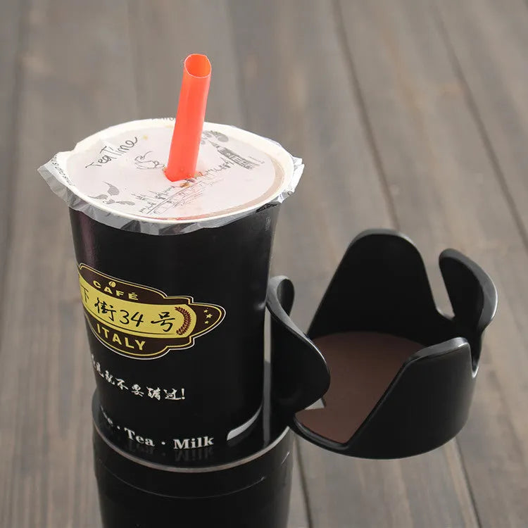 Car multifunction cup holder and navigation bracket in various colours on dashboard