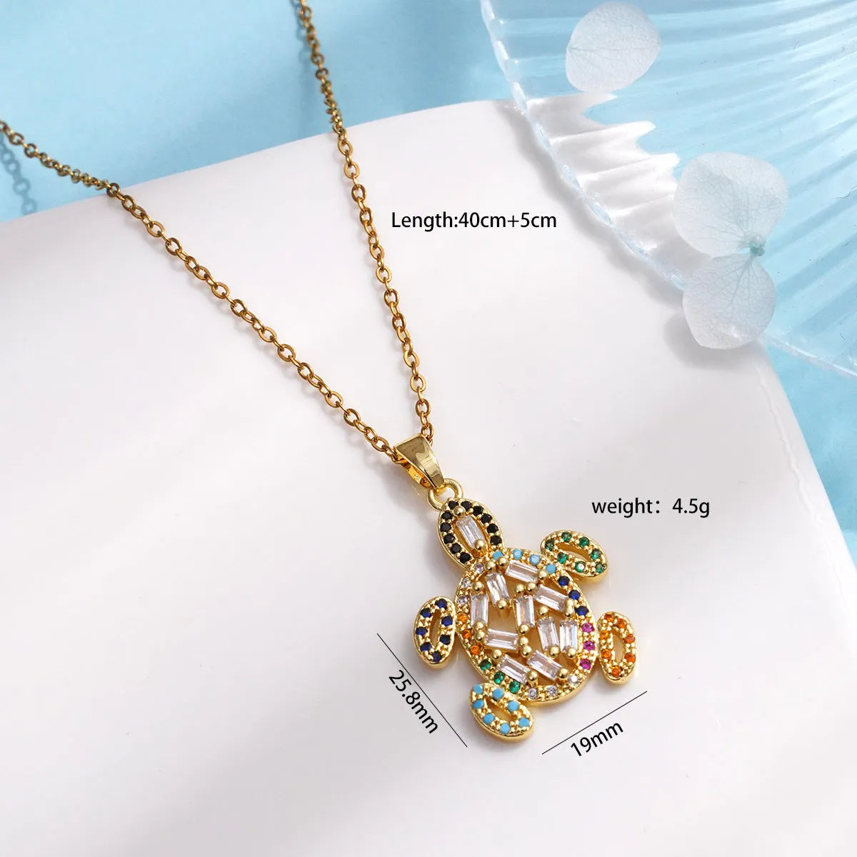Gold-plated copper sea turtle necklace with zirconium accents and mixed gemstone inlay, O-link chain, light luxury style for women