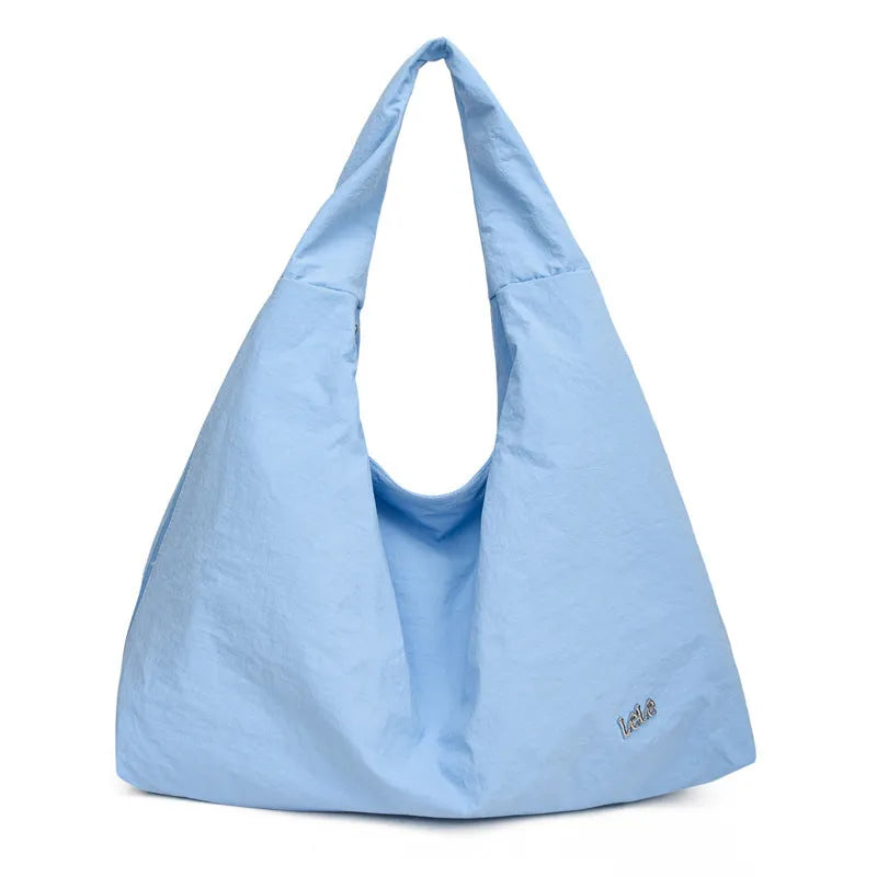 Heart-shaped nylon underarm bag for women in black, blue, khaki, or yellow colour options