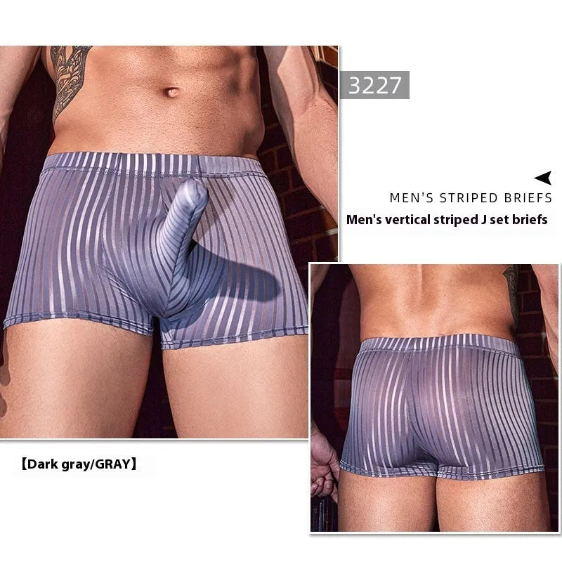 Man's black and white vertically striped boxer briefs laid flat, showcasing the free-size elastic waistband and leg openings.