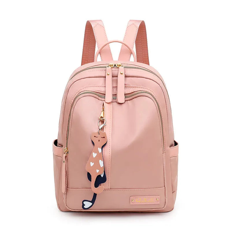 Black casual nylon backpack with double shoulder straps and external pocket.