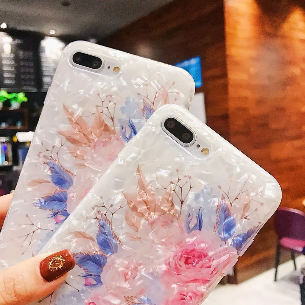 Dream Shell soft TPU iPhone case shown in brown, purple and white colours for multiple iPhone models.