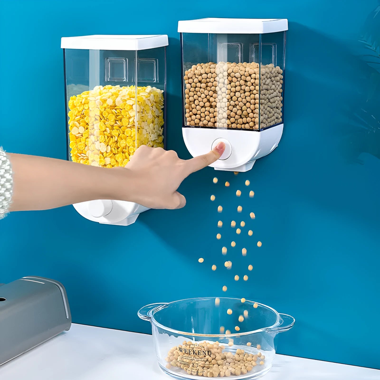 Clear plastic wall-mounted kitchen food storage container with easy-press lid for cereals and dry goods.