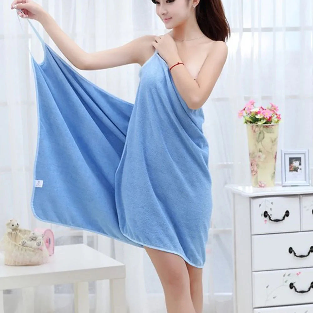 Beach dress towel shown as a wrap cover-up, available in solid pink, blue, purple, red, rose red, and white.
