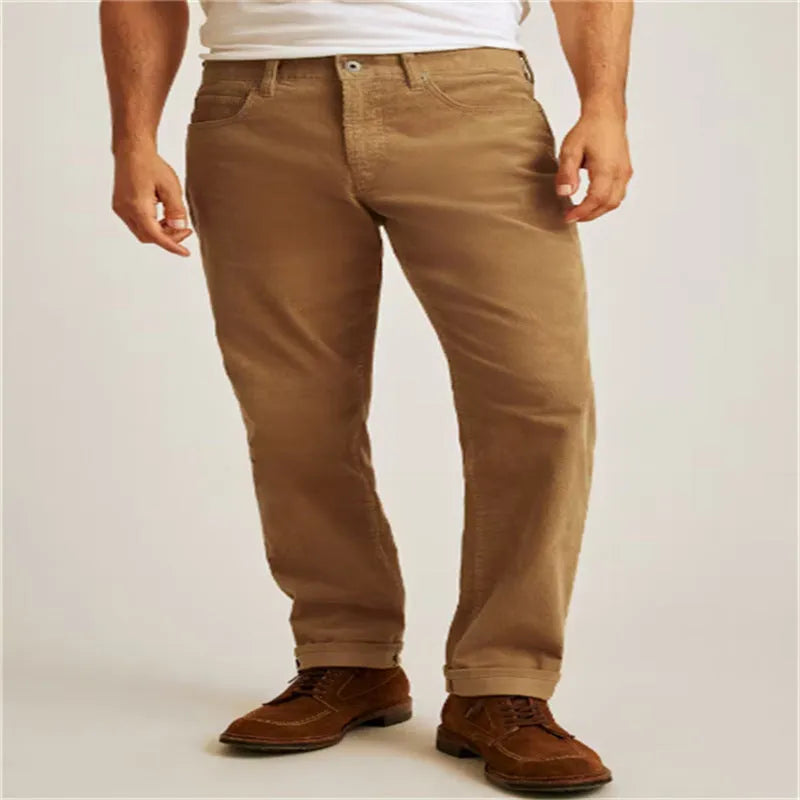 Solid colour corduroy trousers in loose straight-leg style with mid-waist and zip closure